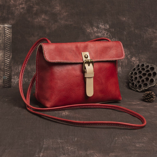 Bolso bandolera con hebilla clásica con el toque tradicional de Rosa