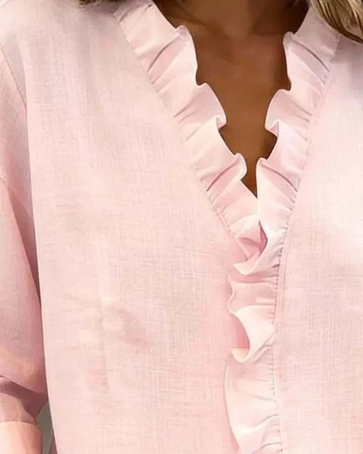 Irene | Blusa elegante con volantes, escote en V y mangas largas