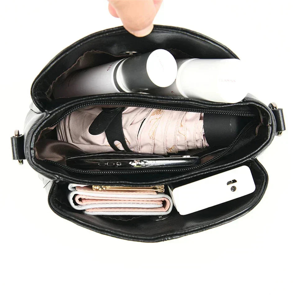 Elegante bolso tote y bandolera de piel bordada para mujer
