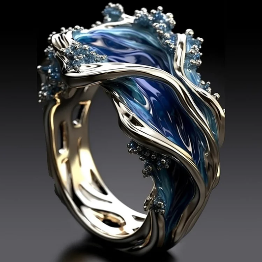 Anillo vintage dorado con olas del mar