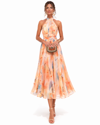 Dolores | Vestido largo fluido con cuello halter y estampado artístico