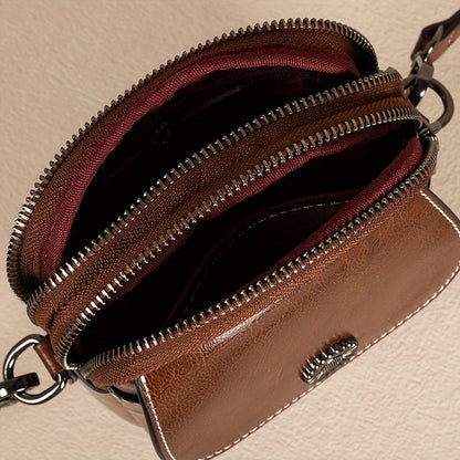 El toque clásico de Laura | Bolso bandolera compacto de piel