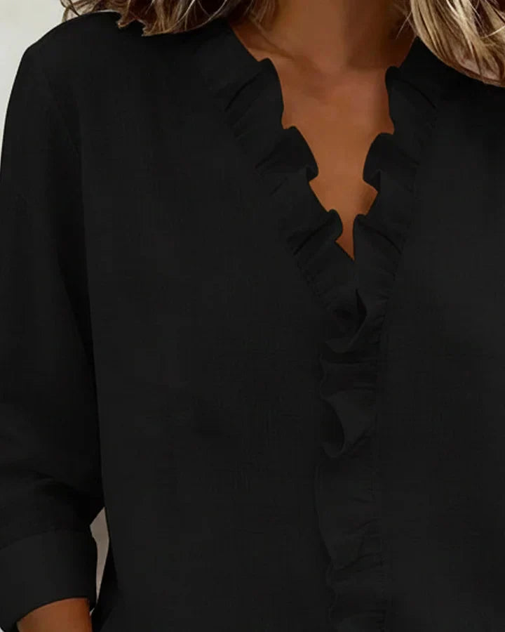 Irene | Blusa elegante con volantes, escote en V y mangas largas