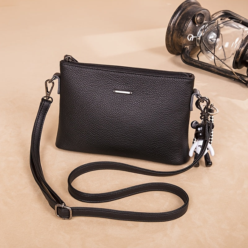 El elegante bolso bandolera de piel minimalista de Elena